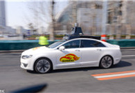 Beijing releases licenses for self-driving car road testing