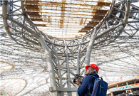 Beijing's new airport getting its roof