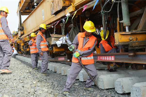 Workers at the construction site of the high-speed railway in Zhangjiakou, Hebei province, on July 31.jpg