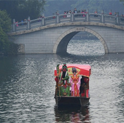 Floating flower market, lantern show add to holiday spirit