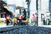 Workers toil through scorching July weather