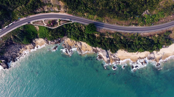 Aerial view of seaside sightseeing highway in Wanning, S China