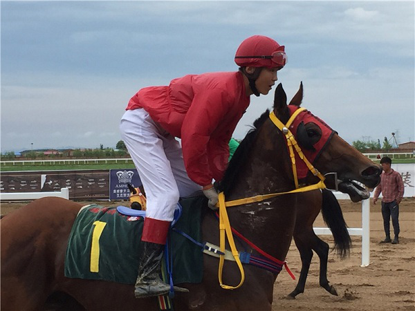 A jockey gets ready to race in Hohhot, July 7.png