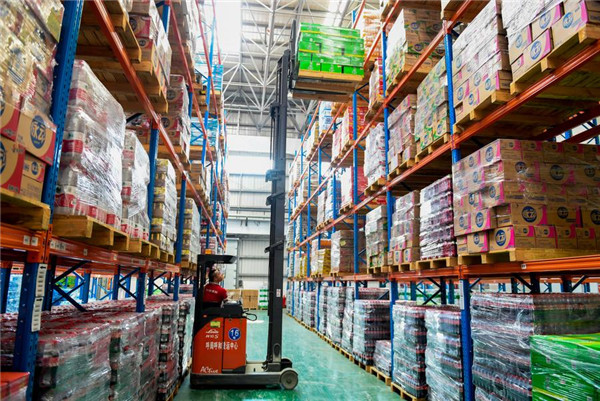 A worker is pictured at the storehouse of the Shaliang Logistics Park in Hohhot, Inner Mongolia autonomous region, July 27.jpg