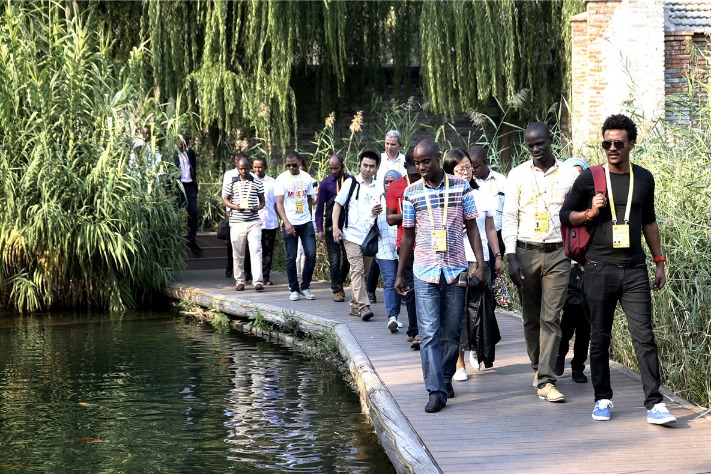 Foreign journalists tour Beijing before anniversary