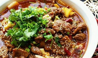 Poached sliced beef in hot chili oil(水煮牛肉/shuǐ zhǔ níu ròu)