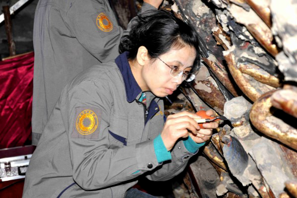 Women finds self-fulfillment in restoring cultural relics