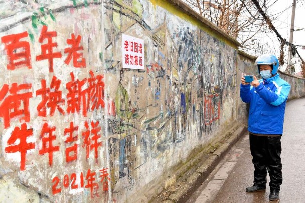 In Wuhan, a food deliveryman records city's recovery