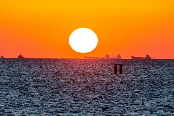 Wonderful sunrise over the sea in Tianjin