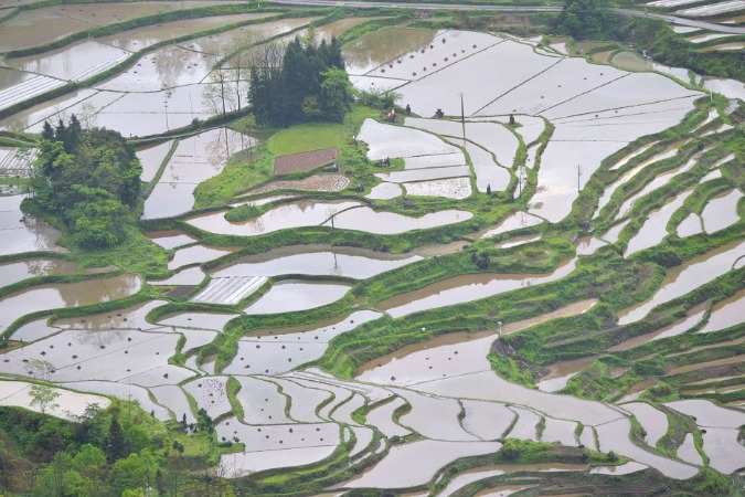 Ancient stockade village makes up pleasant scenes with terraced fields