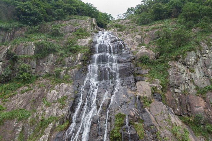 Waterfalls spray on the cliff of world heritage