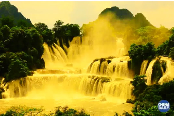 Trans-border waterfall turns golden with heavy rains