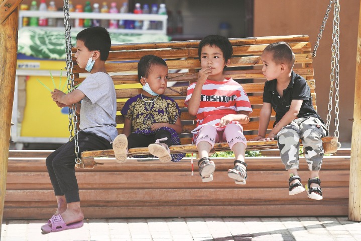 White paper on Xinjiang's demographic development released