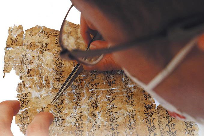 Book restorers bound to saving the past