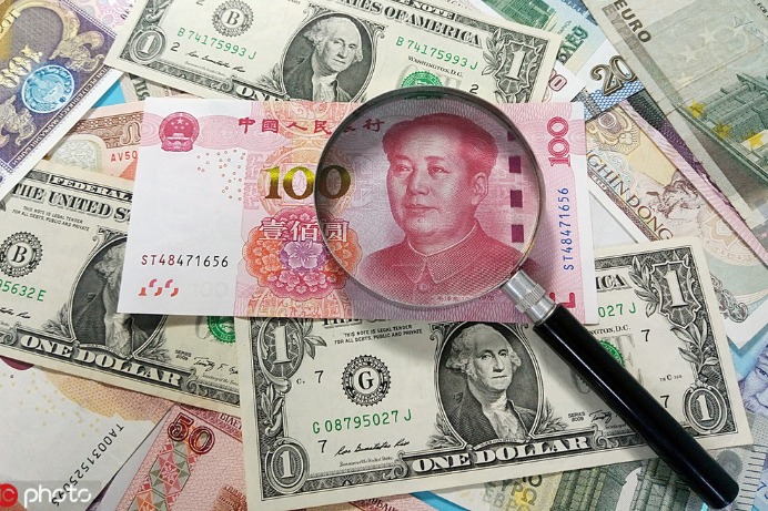 China raises requirement for banks' forex deposits, 2nd time this year