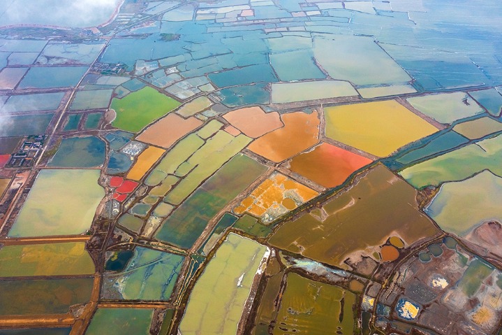 Colorful salt lakes shrouded in mist in Shanxi