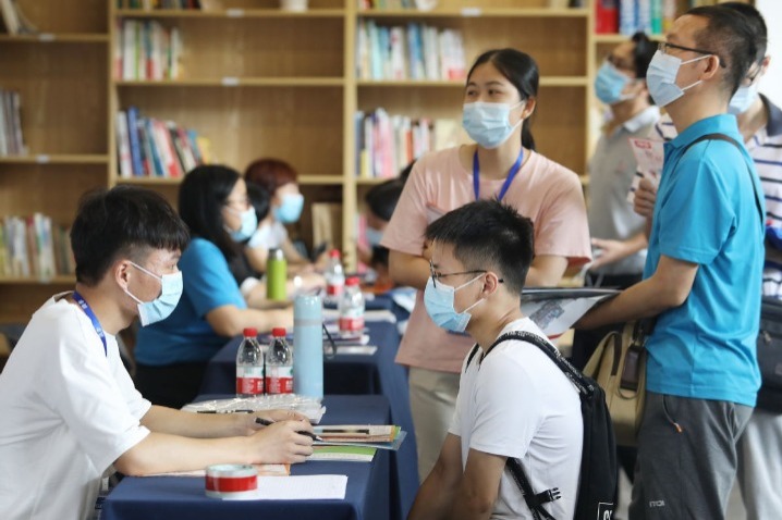 China's surveyed urban unemployment rate down to 5.9% in May