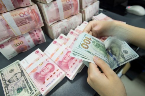 China encourages renminbi settlement in new models of foreign trade