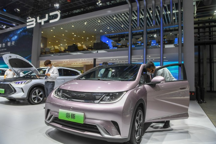 BYD's net profit triples in first half