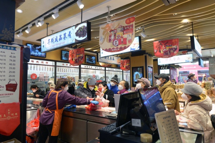 Ready-made dishes edging onto dinner tables of Chinese families