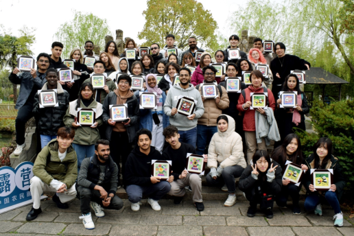 Intl students enjoy spring outing in Shanghai's Fengjing Ancient Town