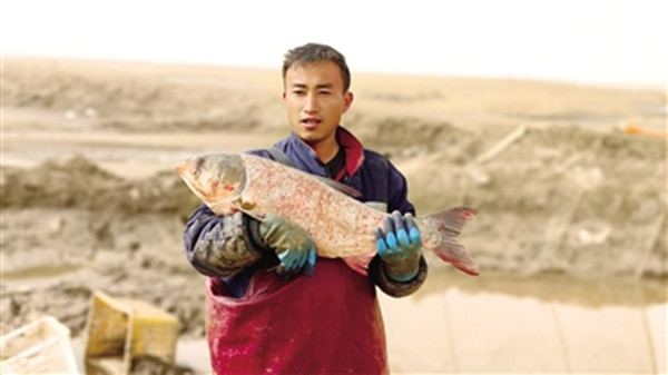 Jiuyuan farmers get rich from fishing, tourism