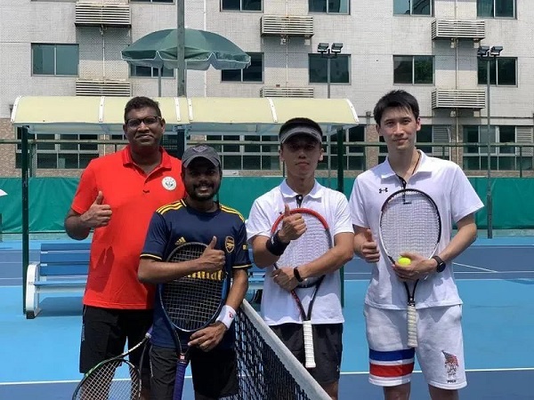 Tennis  players pose for a group photo..jpg