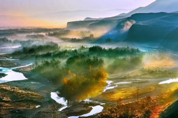 Autumn colors dazzle in river valley in Xinjiang