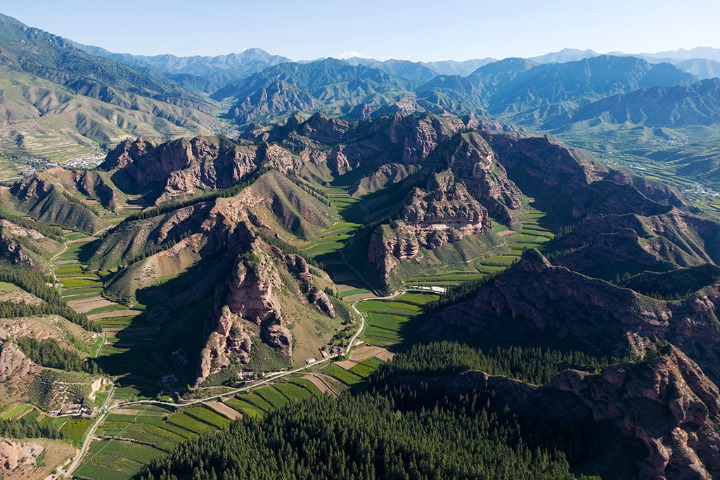 Discover the mesmerizing beauty of Benkang Danxia landform in Gansu