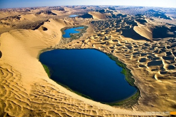 Green miracle in Badain Jaran Desert: Ecological conservation in action