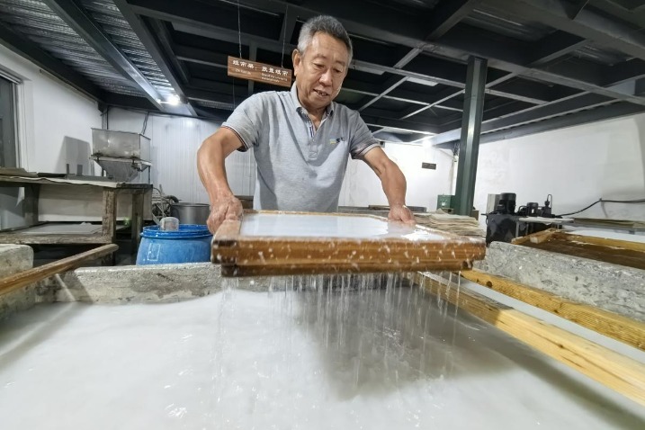 Craftsman works toward art paper perfection