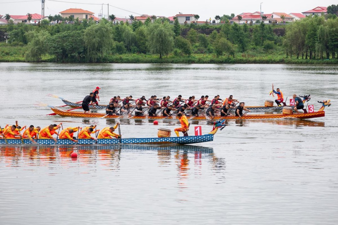 ​Woman, 54, takes on all-male teams in boat racing