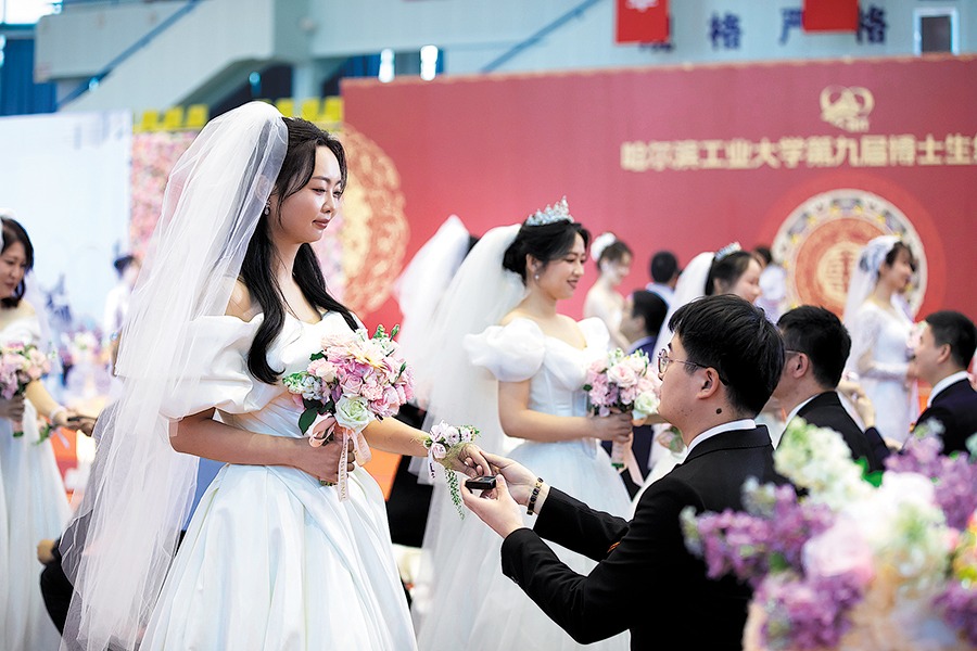 Harbin technology institute hosts 9th group wedding