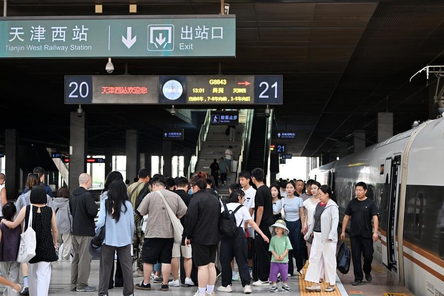 China sees 872 million rail passenger trips in summer travel rush