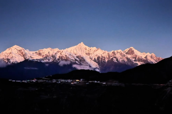 Yunnan’s snow mountain basks in sun’s rays