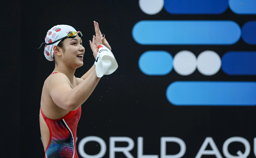 Quzhou's Yu breaks Asian record at Swimming World Cup